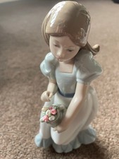 Porcelain Figure Nao Girl holding Vase with Flowers#1001.