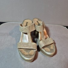 Russell & Bromley gold womens sandals mules. Size 38 or 5. High wedge heel.