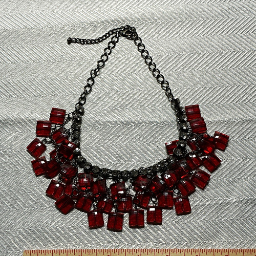 Red black plastic beaded bib - red,