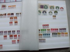 A STOCKBOOK/ALBUM WITH