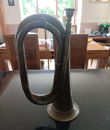 Brown brass bugle with - with, chain