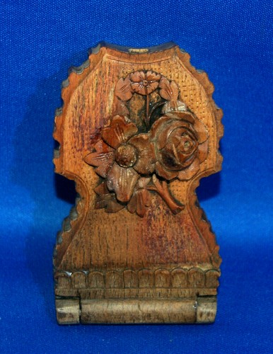 Carved wooden pocket watch - a,