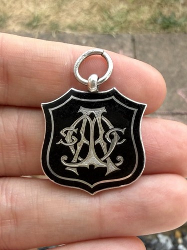 Antique black enamel shield - antique,