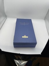 A Royal Mail Commission Long Serving Award neck scarf and silver lapel badge