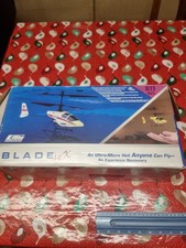eflite blade mcx boxed 4 lipos and charger not sure on flying