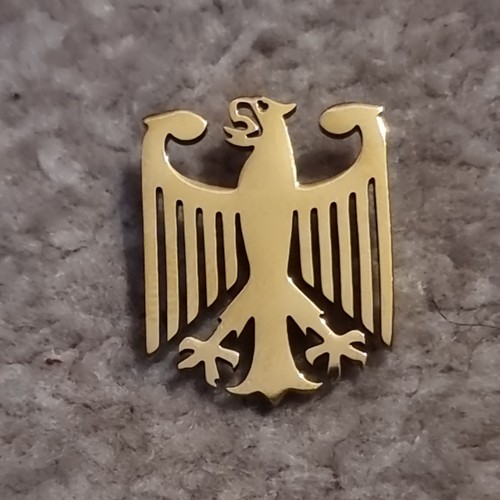 Gold coloured german - gold-coloured,