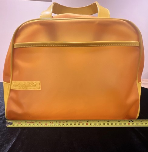 Clarins large yellow bag x9 - clarins,
