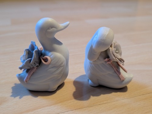 Pair ceramic duck - of,
