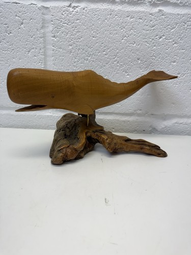 Hand crafted wooden sperm - hand,