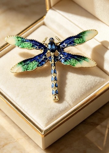 Dragonfly brooch with - , and