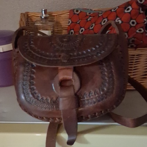 Brown embossed stitched - embossed,