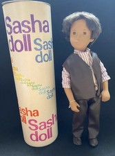 VINTAGE SASHA DOLL.GREGOR WITH BRUNETTE HAIR AND LONDON BOY OUTFIT. ORIGINAL BOX