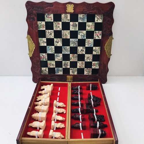 Carved wood chess - set, •