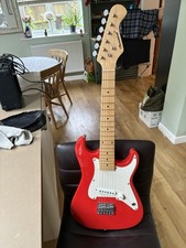 Red Child's Burswood Electric Guitar. 