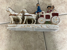 Vintage porcelain horse drawn carriage, 24 cm long.