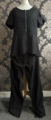 Black short sleeve zip peplum - short,