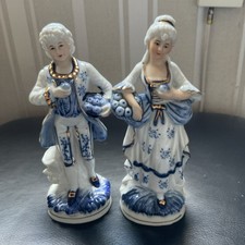 VINTAGE FIGURINES MAN AND