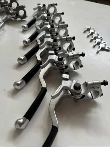 Bracelet and clutch lever for - and,