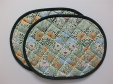Pair of Quilted Oval Table