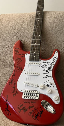 Signed red electric guitar - signed,