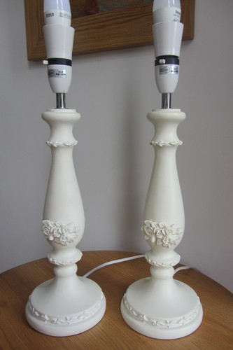 Pair moulded resin lamp - of,