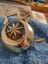 Custom Built Brass Tattoo