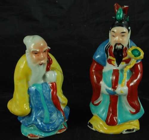 Two oriental figures with - two, (with
