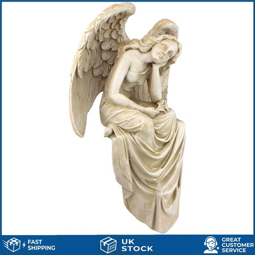Serene resting angel sitting - resting,