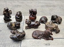 A Collection of 20 Chinese/Japanese Carved Wooden Netsuke Figures.