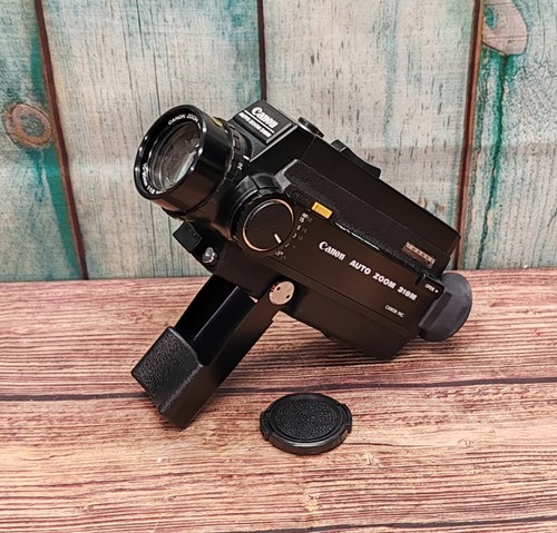 Serviced canon auto zoom 318m - serviced,