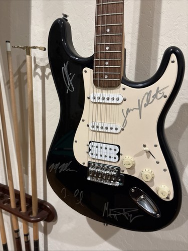 Maroon signed guitar - signed,