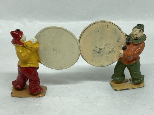 Circus performing clowns with - clowns,
