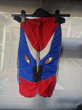 SPIRIT DESIGNS MOTORBIKE ENDURO TROUSERS BOYS SIZE 24 RED WHITE BLUE APROX 3-4YS