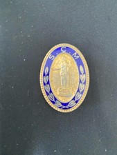 S. C. M. Badge  Thomas