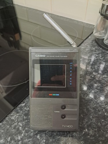 Casio 1400 handheld - tv-1400,