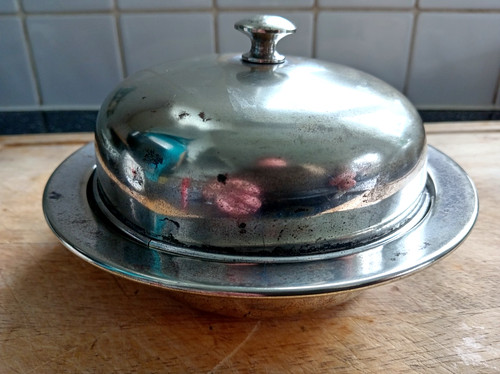 Silver plated muffin warmer.