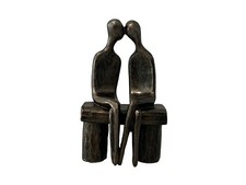 Affectionate couple sitting - couple, on