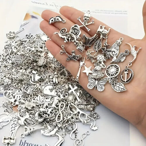 100 silver charms pendants - 100,