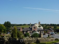 Photo 6x4 The Spanker Toadmoor A pub in Heage, with a windmill on the hor c2010