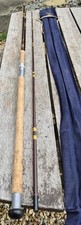 A HARDY FIBALITE SALMON SPINNING ROD 9FT 6IN IN ITS CORRECT MAKERS CLOTH BAG.