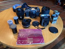 Olympus OM20 35mm the OM10 upgrade 50mm, 28-70mm, 135m Lenses, Flash, Case, Bag+