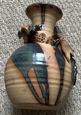 Hand thrown pottery vase with