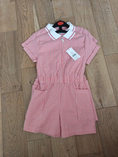 Girls red school uniform skirt
