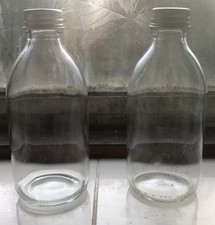 Set of 2 Clear Glass Bottles