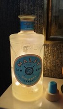 MALFY GIN ROSA gin bottle with LED string lights, frosted glass