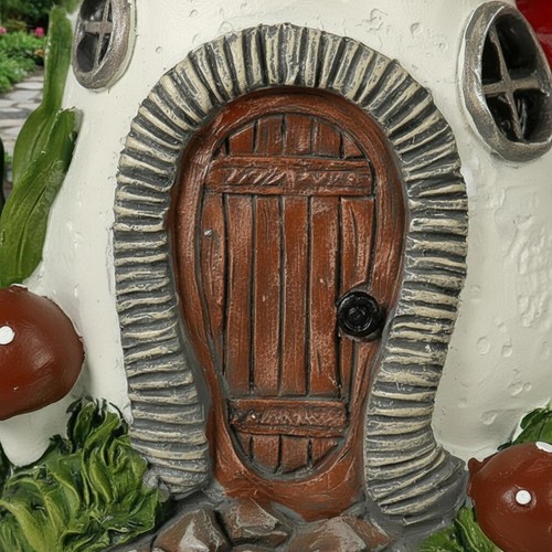 Solar toadstool house hand - solar,