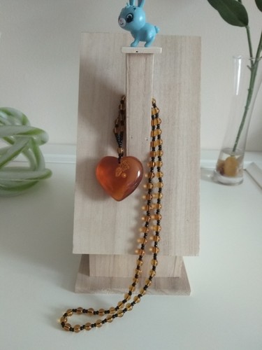 Amber resin heart with - amber,