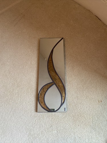 Mirror and metal leaf - and,