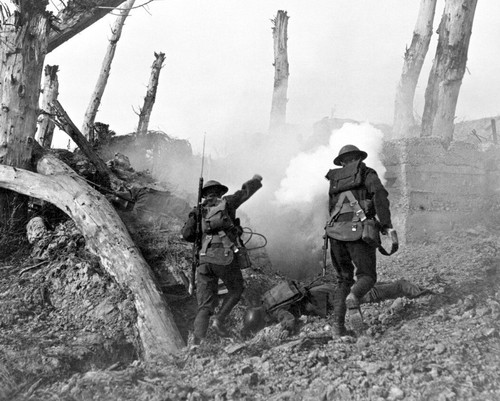 Two army soldiers run - two, past