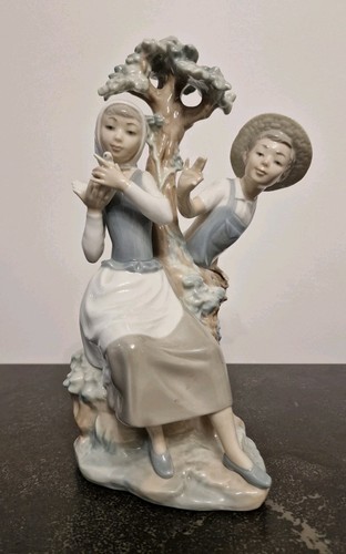 Nao lladro figurine - by,